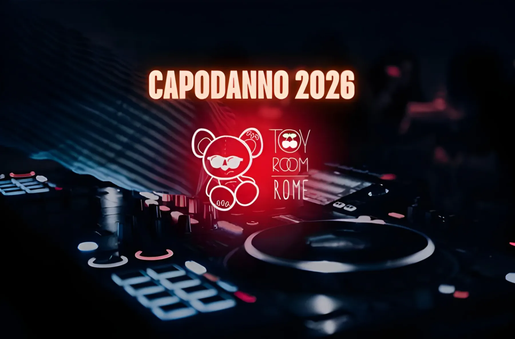 Consolle del Toy Room con l’insegna al neon del club